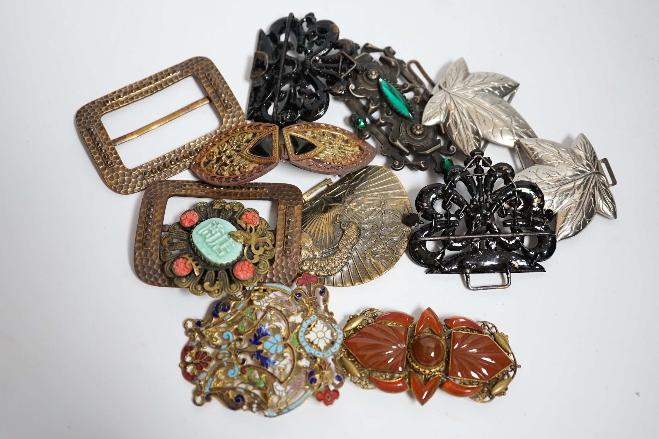 A collection of 20th century and later buckles including jet, Art Deco paste, Japanese Satsuma and two gilt metal and enamel examples